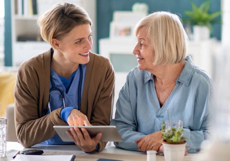 caregiver-with-senior-woman-patient