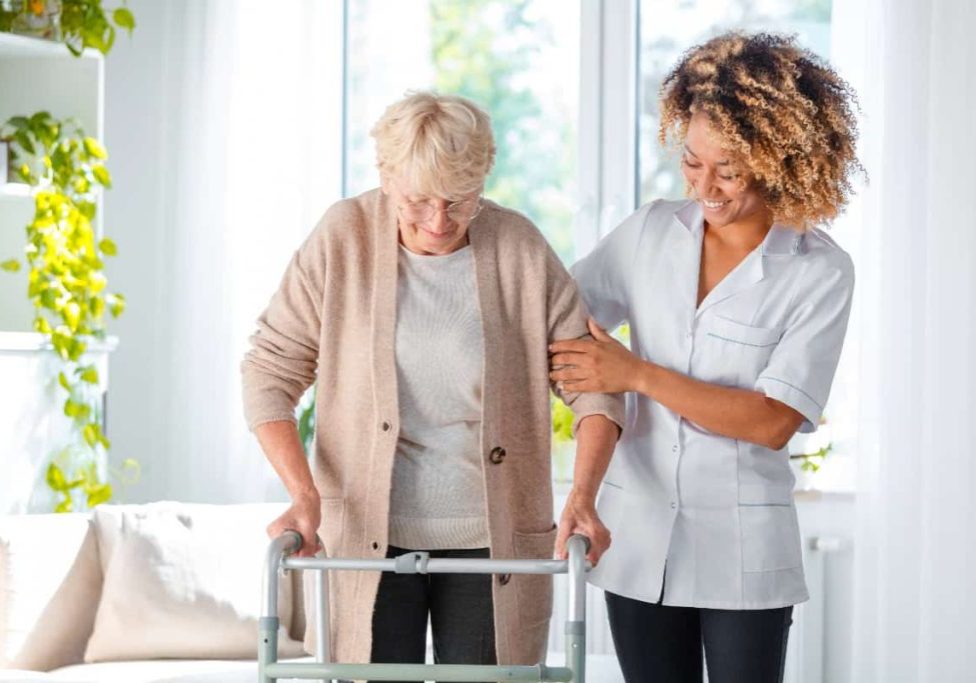 senior-and-caregiver-holding