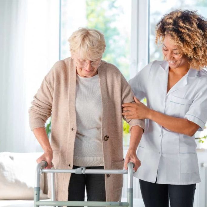 senior-and-caregiver-holding